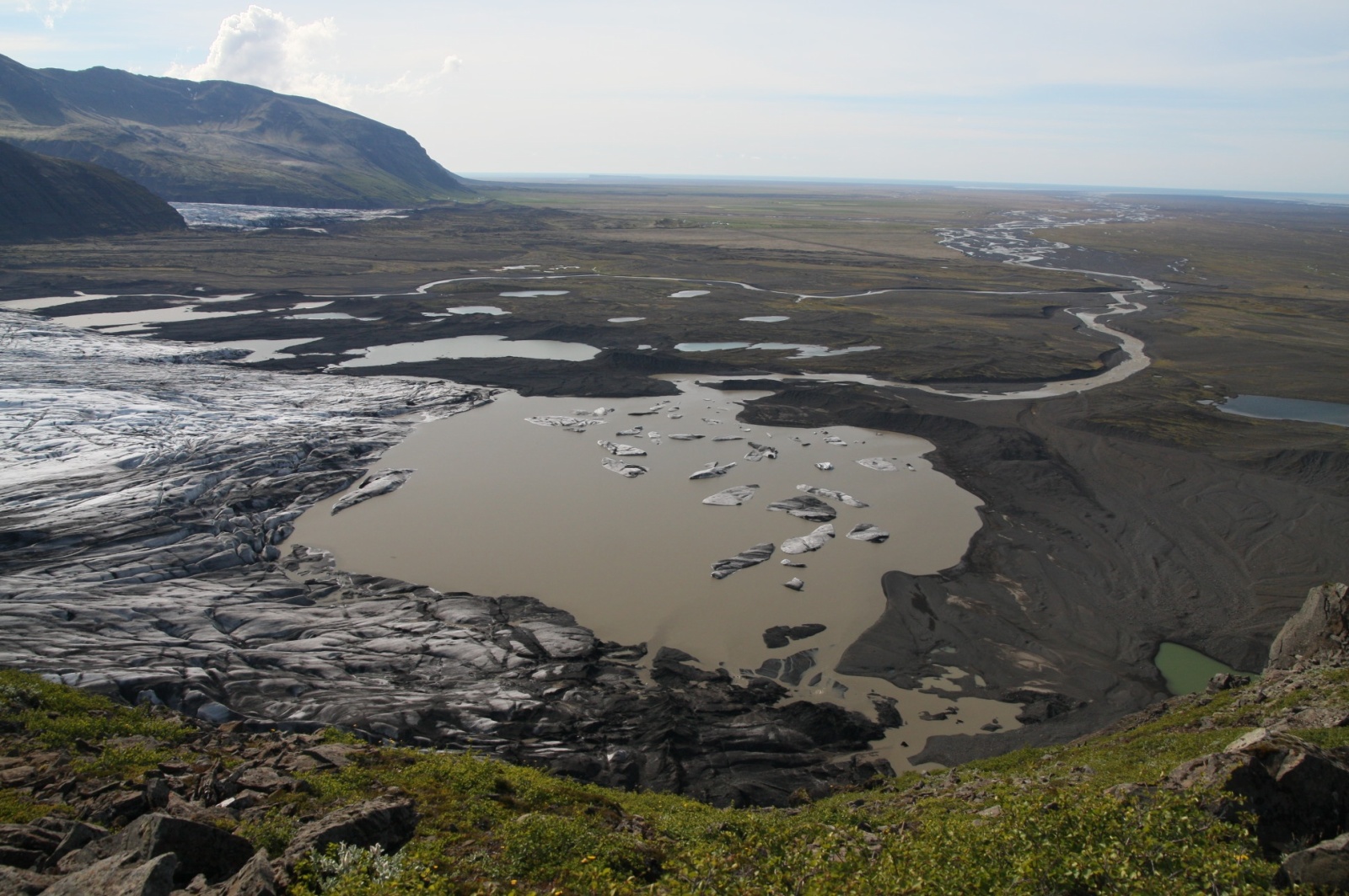 View to the south - it is clearly seen that sometimes during sub-ice volcano eruptions there are lots of water flowing into the ocean