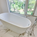 Freestanding bathtub in master bathroom