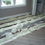 Foam insulation applied in between floor joist