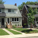 Front porch patio replaced by livingroom extension and finished with entrance stairs with railings