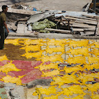 Animal skins are drying first on the roofs