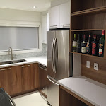 Kitchen Renovation - White Granite Countertop and Stainless Steel Appliancesplug