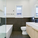 Modern Bathroom with black big tiles