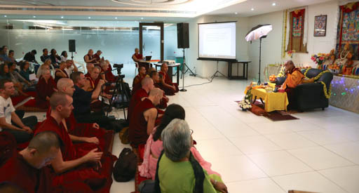 Lama Zopa Rinpoche giving a public talk organized by Choe Khor Sum Ling, Bangalore, India, January 2015. Photo by Ven. Thubten Kunsang.