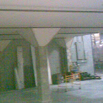 Concrete slab with supports in industrial complex