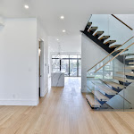 Modern stars leading into the kitchen area with white oak engineered flooring