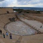 Which Roman city could survive without an amphitheatre?