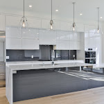 Modern kitchen with TCE stone quartz countertop and white cabinetry