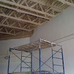 Corrugated metal roof with trusses: foam insulation applied