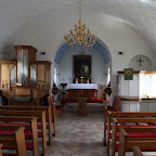 The interior of a small Icelandic lutheranian church