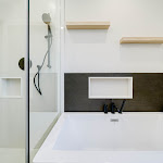 Modern shower and bathtub with shampoo niches