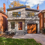 Front view of modern house with interlock porch entrance