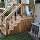 Modern wooden stairs with railings