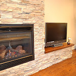 Stone tile electric fireplace with built in side table