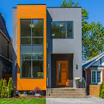 Front view of new modern house with polished concrete porch entrance