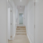 Main hallway in the basement with polished concrete flooring