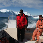 Onboard the boat of a local seal hunter, riding along the fjords