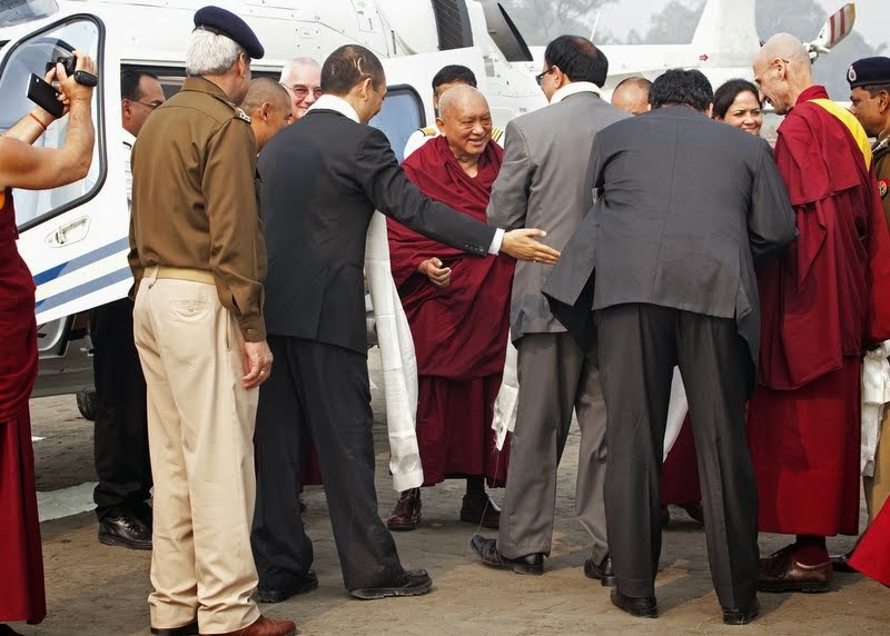 Lama Zopa Rinpoche arriving for Maitreya Project ceremony, Kushinagar, India, December 13, 2013. Photo by Andy Melnic.