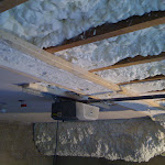 Garage: foam insulation applied in between ceiling joists
and around ducting