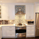 Glass Tiles Backsplash creates very elegant look to newly renovated kitchen