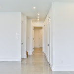 Basement hallway with polished concrete flooring