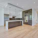 Open concept modern kitchen with TCE stone quartz cabinet