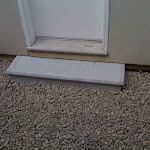 Gravel and stone step added to side entrance