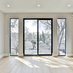 Modern windows looking out towards the backyard