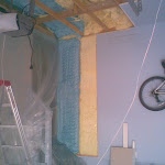 Foam insulation applied in between ceiling joist
and a small part of wall