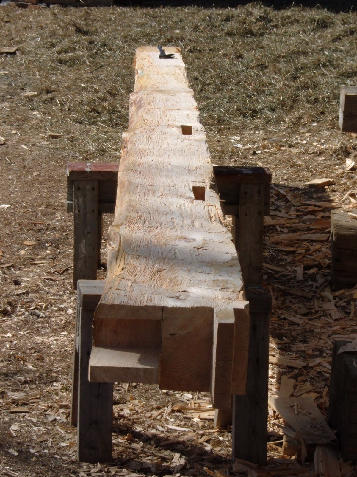 Hewn hemlock post replicating the orignal joinery for the english tying joint.