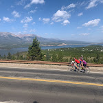 Beautiful mountains and green valley, some Eyecycle riders on the Triple Bypass