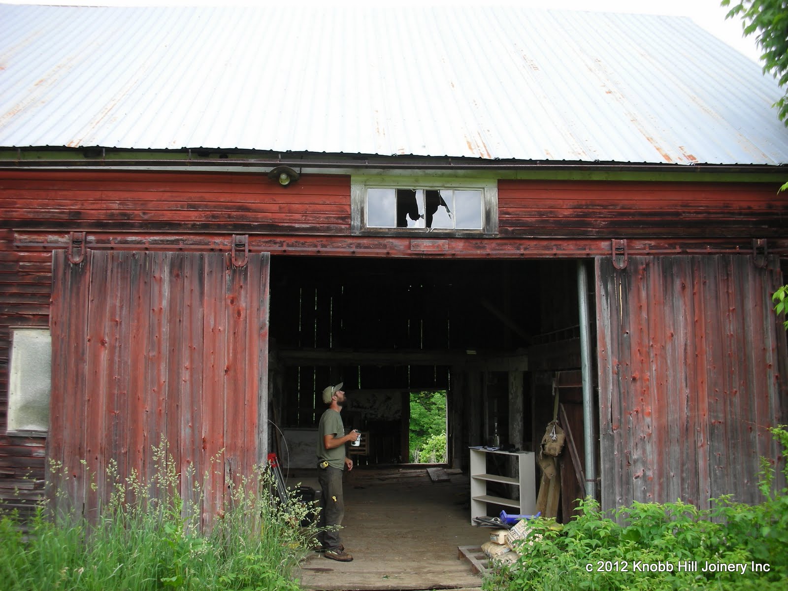 Two sides of the barn facing the road had been clapboarded in the late 1800's.