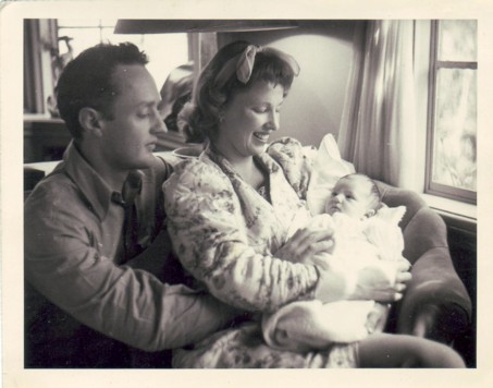 Feather Meston as a baby with parents.