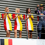 Daniel Ricciardo on his way to the podium with F1 grid girls