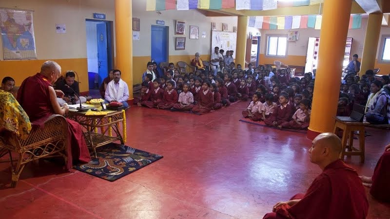 Lama Zopa Rinpoche teaching the children of Maitreya School and Tara Children’s Home, Root Institute, Bodhgaya, India, March 2014. Photo by Andy Melnic.