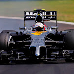 Kevin Magnussen locks up the McLaren MP4-29