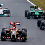 Pastor Maldonado, Lotus E22 Renault, leads Kevin Magnussen, McLaren MP4-29 Mercedes