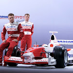 15 Dec 2001: Alan McNish and Mika Salo pose with the new Toyota TF102 launch