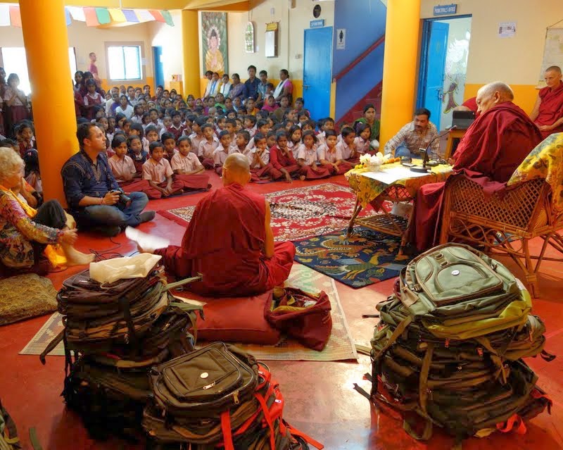 Lama Zopa Rinpoche giving a talk to students, staff and parents at Maitreya School at Root Institute, Bodhgaya, India, March 2014. Photo by Ven. Roger Kunsang.