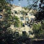 Hospital and most buildings are well hidden behind the trees