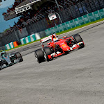 Sebastian Vettel, Ferrari SF15-T in front of Nico Rosberg, Mercedes W06