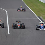 Max Verstappen & Felipe Nasr passing Jenson Button from 2 sides