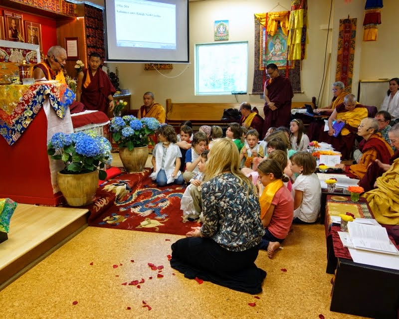 Lama Zopa Rinpoche speaking to the children of Kadampa Center, Raleigh, North Carolina, US, May 3, 2014. Photo by Ven. Roger Kunsang.