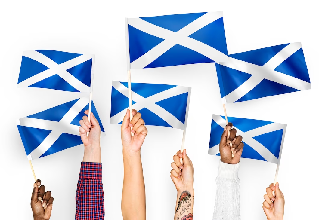 People holding Scotland Flags