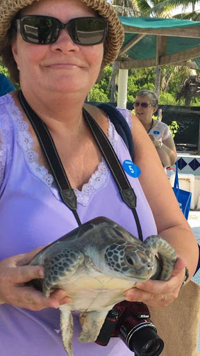 Me holding a sea turtle.jpg - That's my friend Laurie holding a turtle that was saved at the sanctuary in Manzanillo.