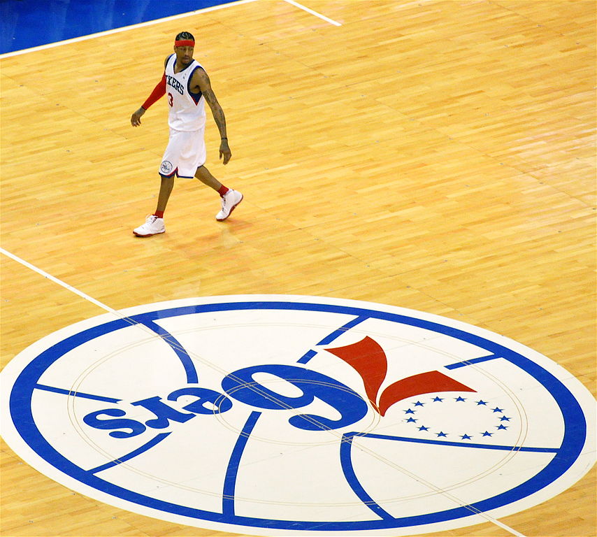 https://upload.wikimedia.org/wikipedia/commons/thumb/1/12/Allen_Iverson_and_the_Sixers_logo.jpg/854px-Allen_Iverson_and_the_Sixers_logo.jpg