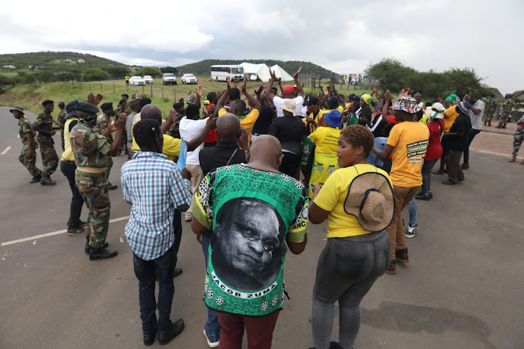 Zuma supporters and MKMVA members outside his Nkandla home.