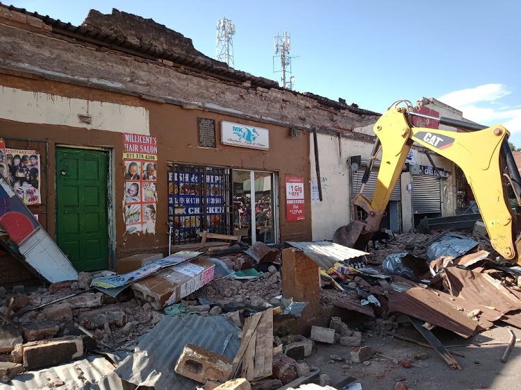 The Ngcobo building housed a hair salon and other businesses, where four people died after a wall collapsed.