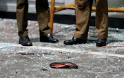 A shoe of a victim is seen in front of the St. Anthony's Shrine, Kochchikade church, after an explosion in Colombo, Sri Lanka, on April 21 2019. 