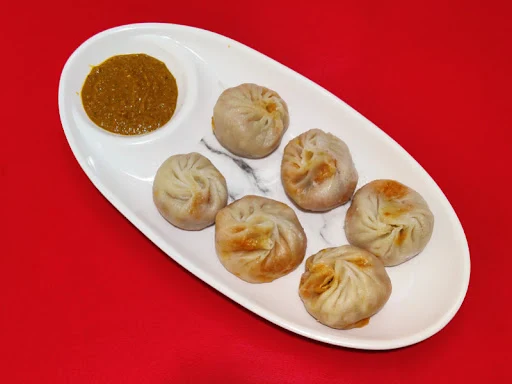 Veg Schezwan Steamed Momos